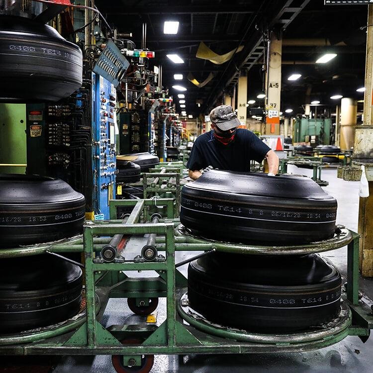 Tire curing press operation